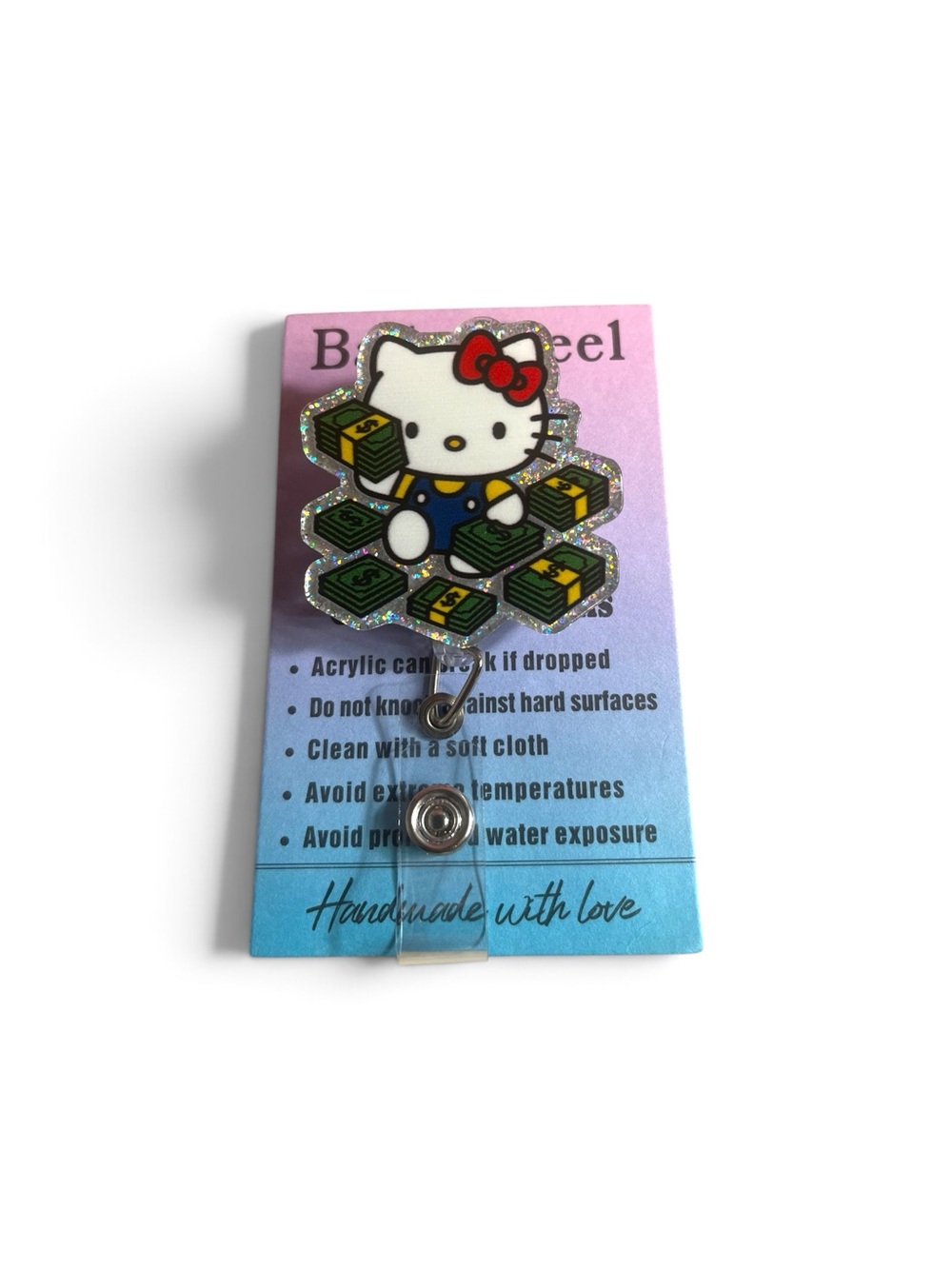 Sanrio Hello Kitty Badge Reel with Pink, Red, White, Blue, Green, Yellow Details